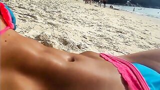 Sexy navel on display at the beach