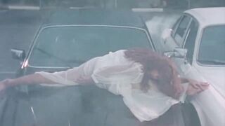 tawny Kitaen pumping a car in that Whitesnake movie