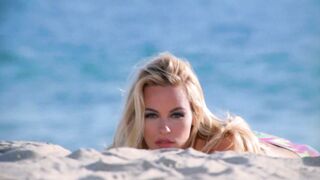 Pamela Anderson crawling toward you from 