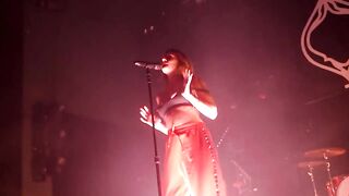 Tove Lo pulling her tits out during a concert