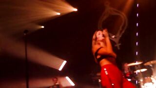 Tove Lo pulling her breasts out during a concert