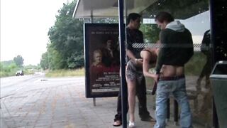 Gal Receives The one and the other Ends Filled At A Public Bus Shelter