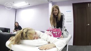 Korean Pop Music: Rose spanks Lisa's butt during a massage.