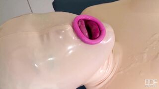 Latex Lucy: Cum covered latex doll