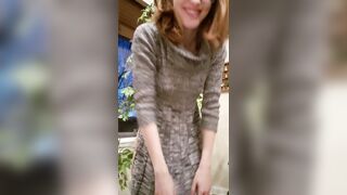 Impossibly cute in her sweater dress - Lifted Skirts