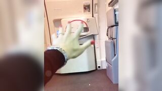 Flight attendant has the magic in her hand