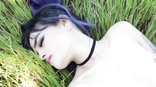 Holly Beth lying in the grass